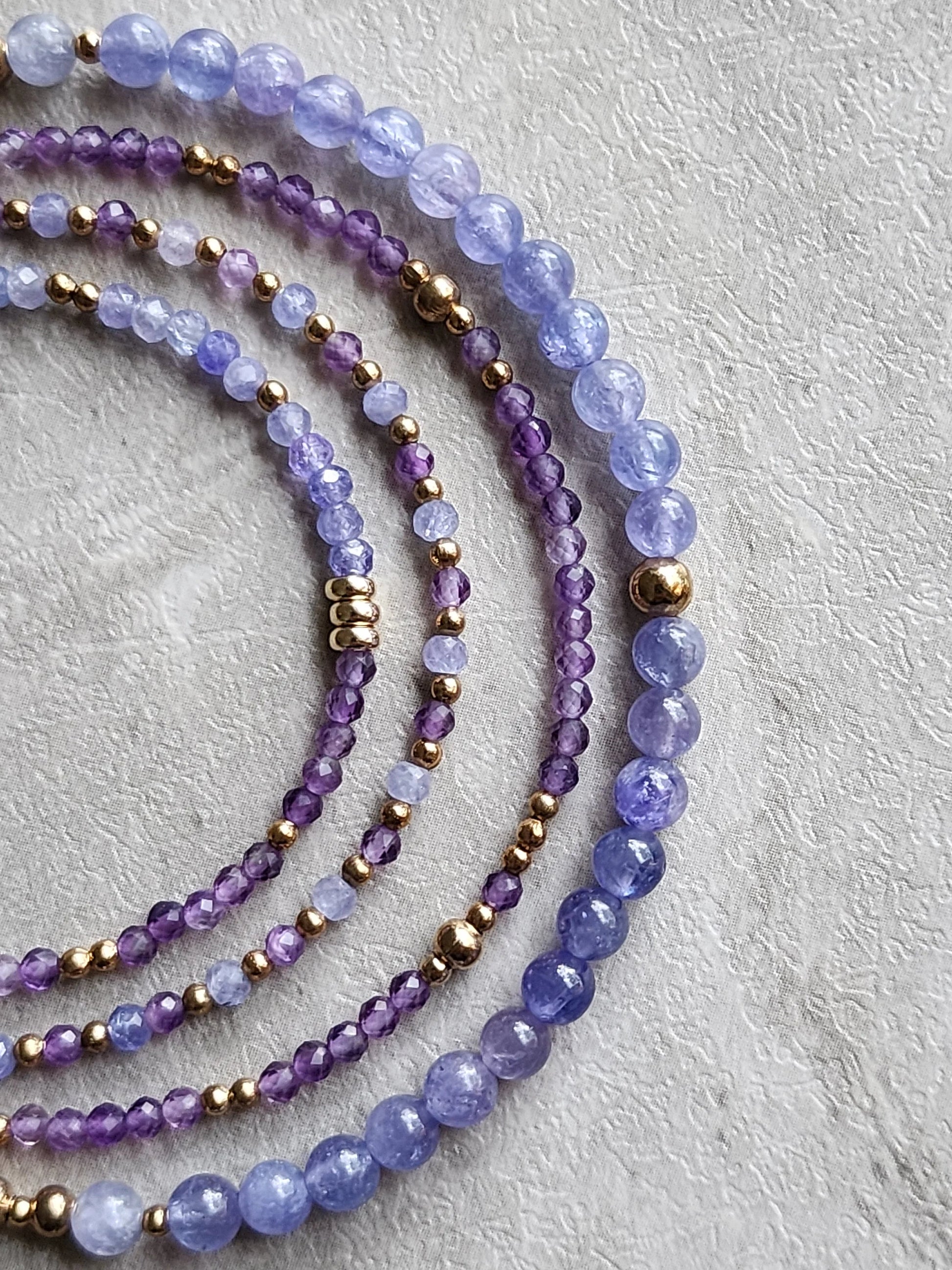 Tanzanite, amethyst, and buy selenite with amethyst pendant beaded bracelet set.